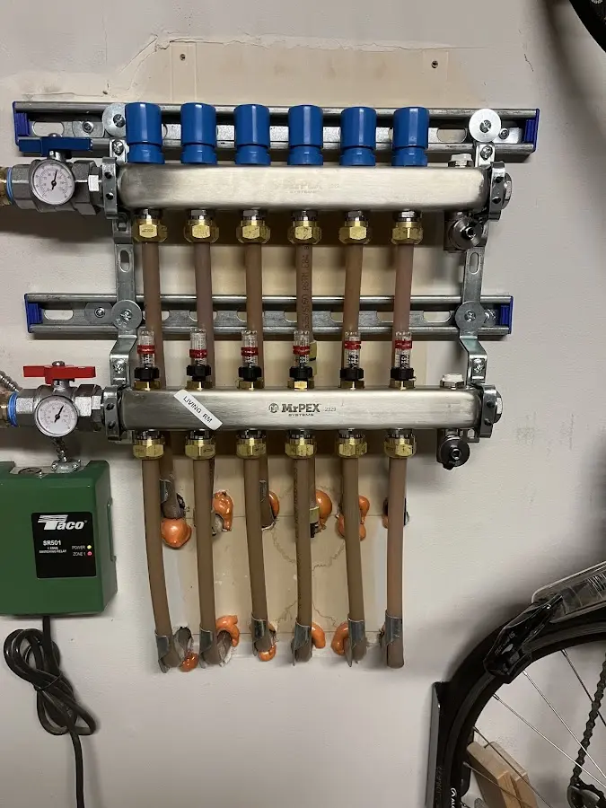 Plumber performing Water Heater Repair at a residential property in North Bay Village